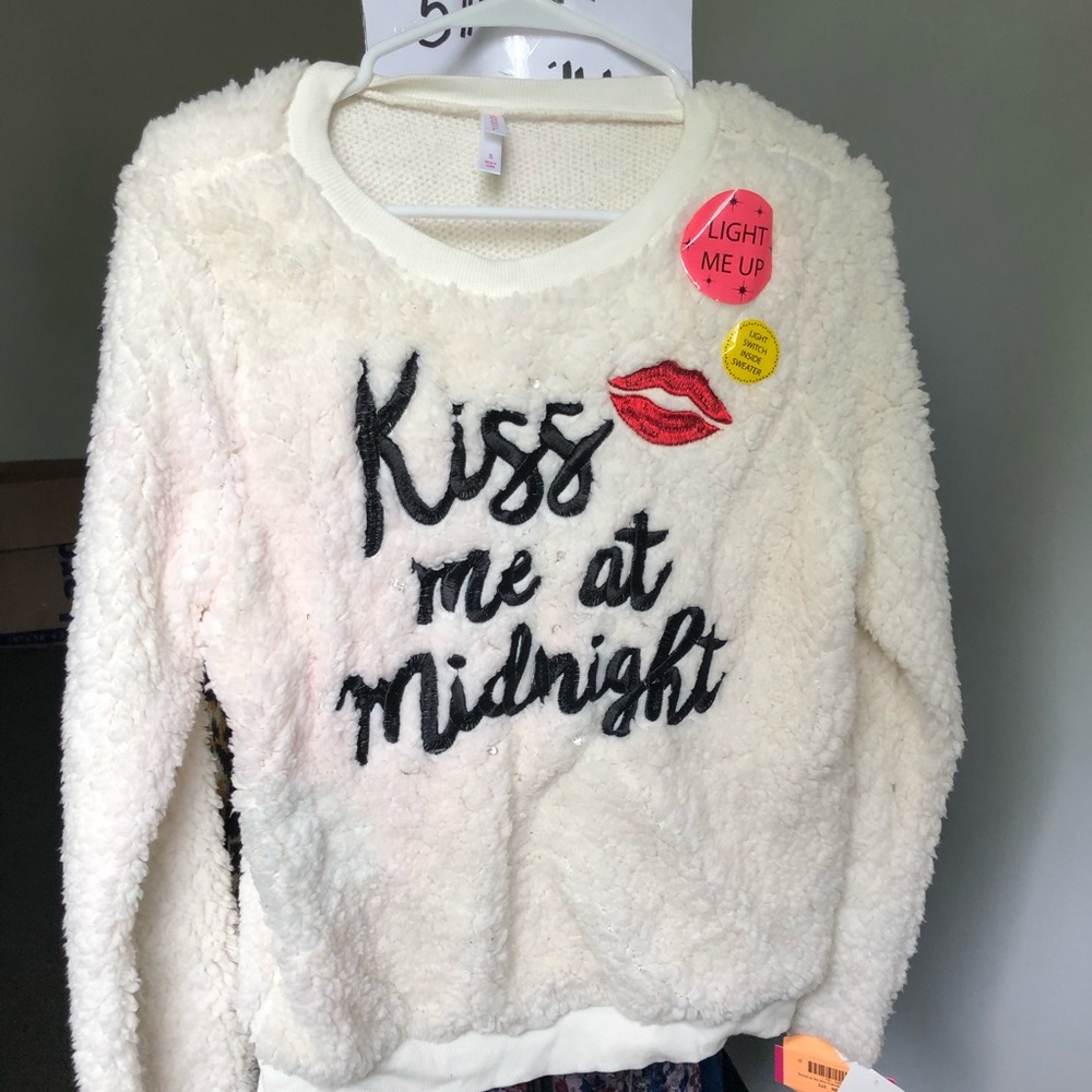 White sweater with a light switch